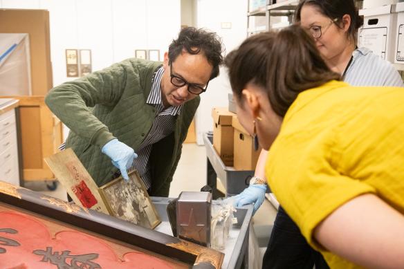 collections people looking at artifacts